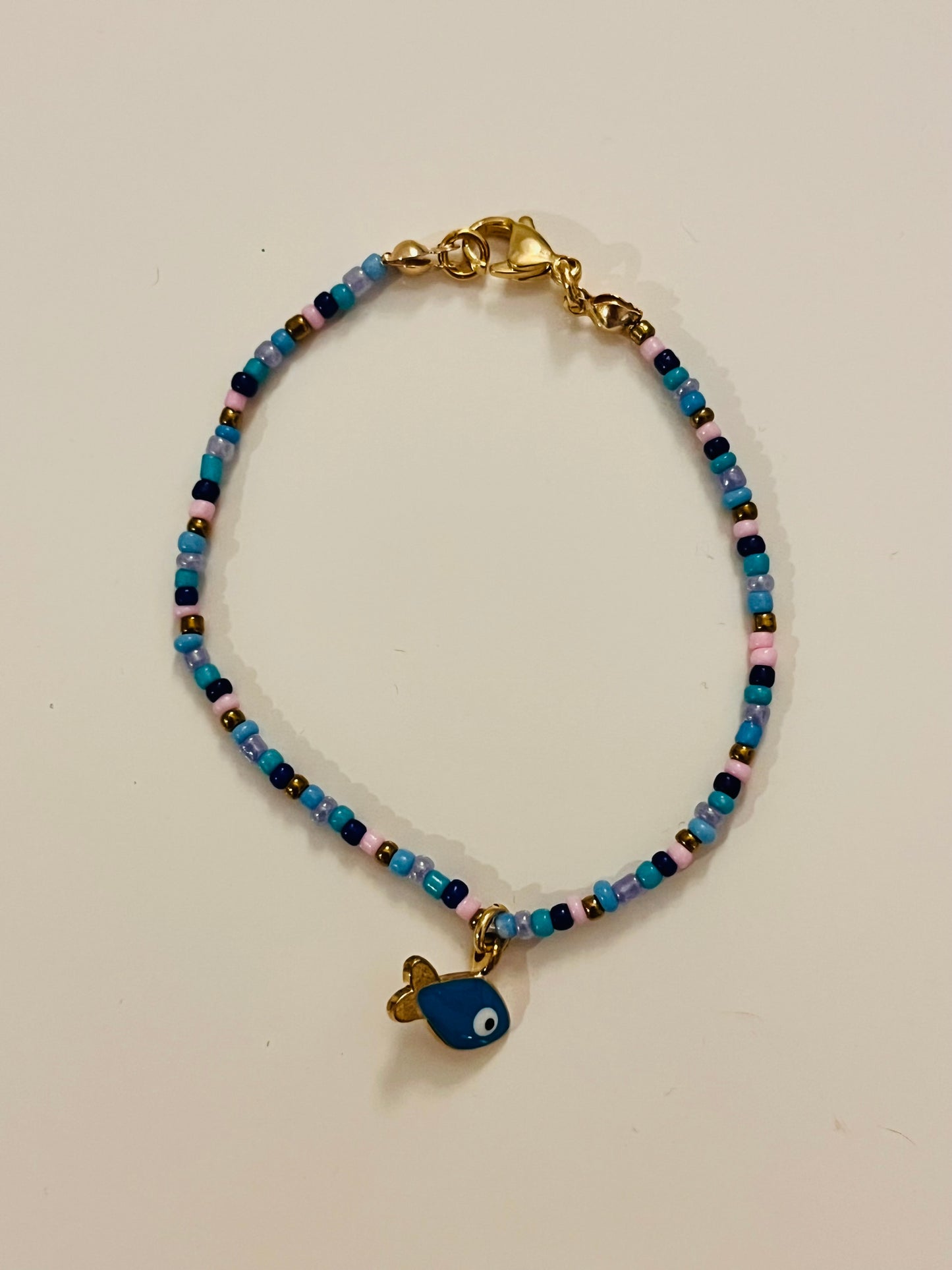 Gold and Blue Fish Bracelet